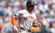 San Francisco Giants' Rafael Devers rounds the bases after hitting a three-run home run du...