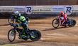 Dan Thompson of Ipswich Witches in yellow rides inside Zach Cook of Belle Vue Aces in red...