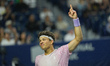 Ben Shelton of the United States celebrates a point against Taylor Fritz of the United Sta...
