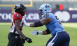 Ottawa RedBlacks linebacker Robert Priester #23 fights through a block from Toronto Argona...