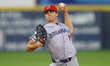 Binghamton Rumble Ponies pitcher Jonathan Santucci #9 throws during the third inning of a...