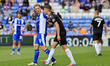 Tom Conlon of Oldham Athletic Association Football Club and Ben Perry of Colchester United...