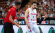Head coach Igor Milicic talks to Andrzej Pluta during a basketball international friendly...