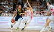 Melwin Pantzar and Andrzej Pluta play during a basketball international friendly match bet...