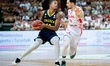 Melwin Pantzar and Andrzej Pluta play during a basketball international friendly match bet...