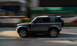 A Land Rover Defender passes on Argyle Street in Mongkok in Hong Kong, China, on August 9,...