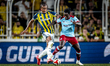 Fenerbahce SK midfielder Archie Brown and Feyenoord Rotterdam defender Jordan Lotomba play...