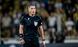Referee Istvan Kovacs officiates during the match between Fenerbahce and Feyenoord at the...