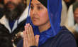 Sikhs offer prayers at a gurdwara (Sikh Temple) during Vaisakhi in Toronto, Ontario, Canad...