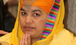 A Sikh woman offers prayers at a gurdwara (Sikh Temple) during Vaisakhi in Toronto, Ontari...