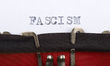 The word 'FASCISM' is typed on a vintage typewriter. This close-up of the word ''FASCISM''...