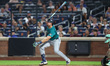 Seattle Mariners player Cal Raleigh (29) doubles during the eighth inning of the baseball...