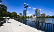 Visitors pass through Lake Eola Park in the central region of Orlando, United States, on S...