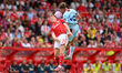 Elliott Anderson of Nottingham Forest and Yehor Yarmolyuk of Brentford battle for the ball...