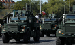 In Warsaw, Poland, on August 15, 2025, a Cougar MRAP armored personnel carrier participate...