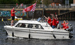 Forest supporters cruise on the Trent ahead of the Premier League match between Nottingham...