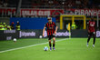 Alexis Saelemaekers of AC Milan is in action during the Coppa Italia Frecciarossa match be...