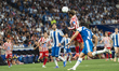 Antoine Griezmann heads the ball during the LaLiga EA Sports match between RCD Espanyol an...