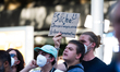 More than a hundred counter-protesters gather at the other end of the AfD rally site to pr...