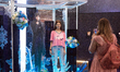 A fairgoer poses for a picture at the Love and Deepspace booth at the Cologne trade fair c...