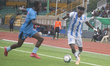 Zechariah Timothy of Rivers United controls the ball before Coulibaly Chaka of Remo Stars...