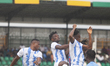 Players of Rivers United clear the ball away as Remo Stars, last season's champions, face...