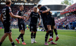 Wisla players celebrate scoring a goal during the game between Wisla Krakow and Slask Wroc...