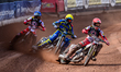 Jaimon Lidsey of Belle Vue Aces in red leads Anders Rowe of Sheffield Tigers in yellow and...