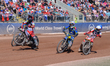 Zach Cook of Belle Vue Aces in Red picks up some drive ahead of Tate Zischke of Belle Vue...