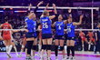 Players of Japan celebrate after scoring during the FIVE Volleyball Women's World Champion...