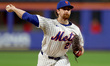 New York Mets starting pitcher Nolan McLean (26) throws during the fifth inning of a baseb...
