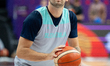 Luka Doncic warms up ahead of the FIBA EuroBasket match between Slovenia and Poland in Kat...