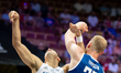 Itay Segev and Tryggvi Hlinason play during the FIBA EuroBasket match between Israel and I...