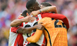 Sunderland players celebrate with Robin Roefs of Sunderland AFC at the full-time whistle d...