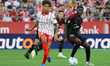 Axel Witsel and Lucien Agoume play during the match between Girona FC and Sevilla FC, corr...