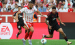 David Lopez and Isaac Romero play during the match between Girona FC and Sevilla FC, corre...