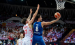 Deni Avdija and Dominik Olejniczak play during the FIBA EuroBasket match between Poland an...