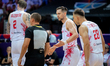 Mateusz Ponitka talks to the referee during the FIBA EuroBasket match between Poland and I...