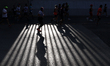 A woman runs during the XLII Mexico City International Marathon in Mexico City, Mexico, on...