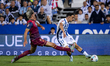 Naim Garcia of CD Leganes (R) is in action with the ball, defended by Arnau Comas of Depor...