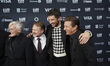 (L-R) Glenn Close, Rian Johnson, Josh O'Connor, and Jeremy Renner attend the red carpet fo...