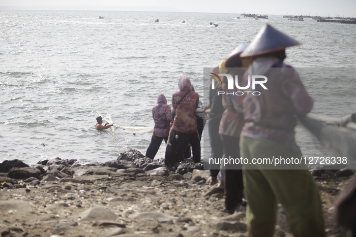 Fishermen Using Beach Drag Nets