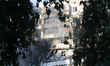 Smoke rises from apartments in a nine-storey residential building in the Sviatoshynskyi di...