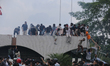 Nepali student protestors clash with police near the Federal Parliament building in Kathma...