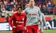 Polish National team warms up ahead of the European qualifiers match between Poland and Fi...