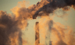 Pollution and steam rise from the stacks of the Miami Fort Power Station, which is situate...