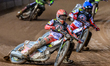 Jaimon Lidsey of Belle Vue Aces in red and Zach Cook of Belle Vue Aces in blue take maximu...