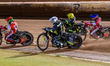 Brady Kurtz of Belle Vue Aces in red leads Tom Brennan of Ipswich Witches in yellow, Dan B...