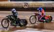 Dan Thompson of Ipswich Witches in white leads Tate Zischke of Belle Vue Aces in blue duri...