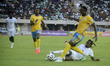 Ademola Lookman of Nigeria clears the ball from Thierry Manzi of Rwanda during the 2026 FI...